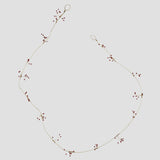 Krans bead garland in aged brass - red